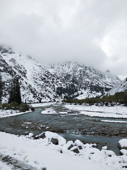 snow covered mountain during daytime
