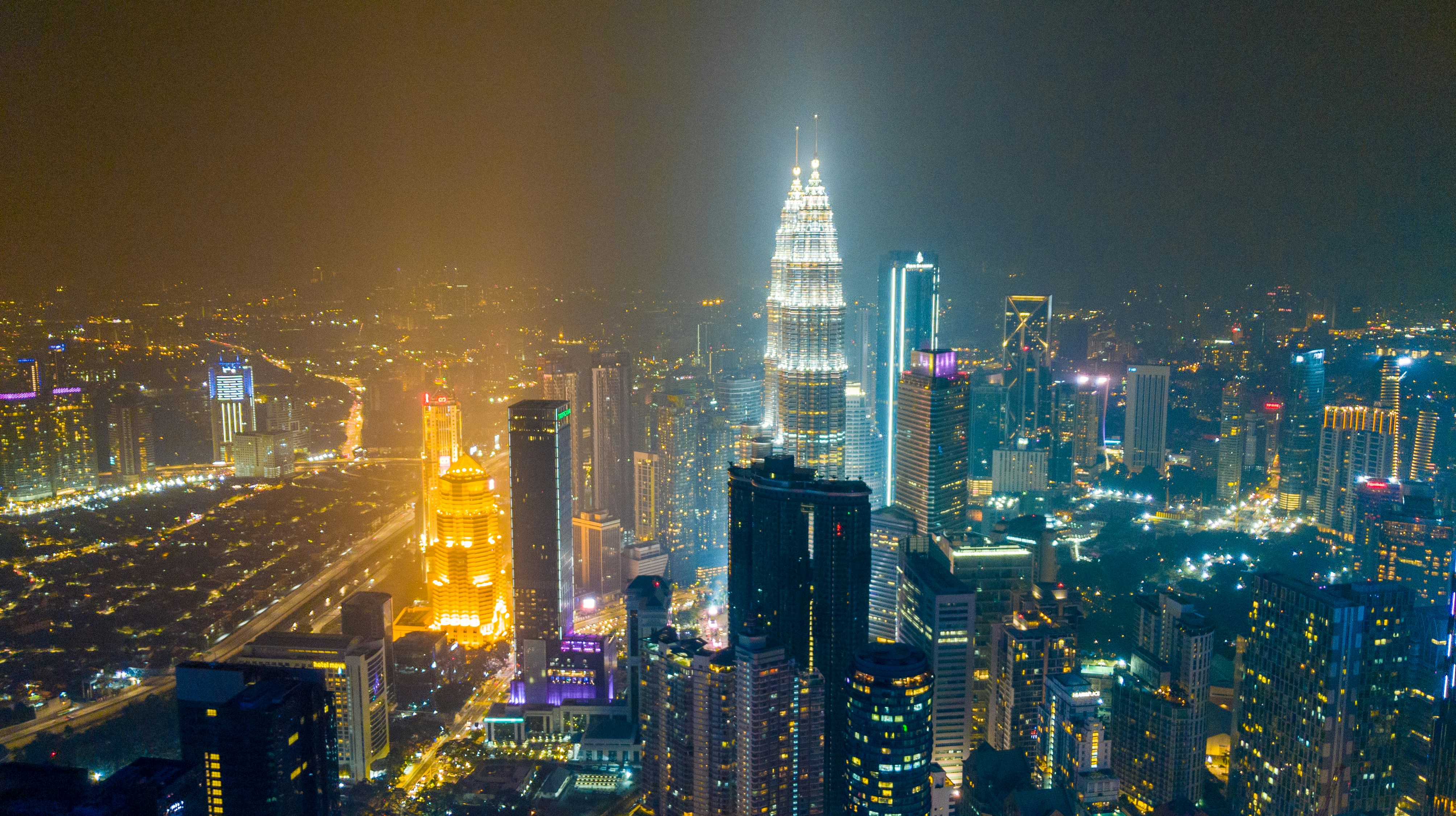 Kuala Lumpur skyline at night with bright city lights