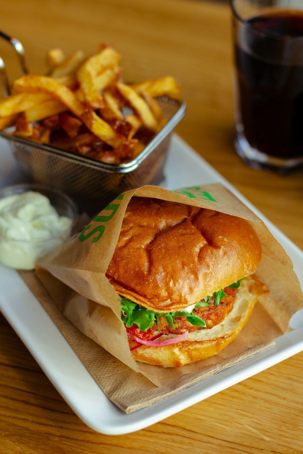 burger on white paper tray