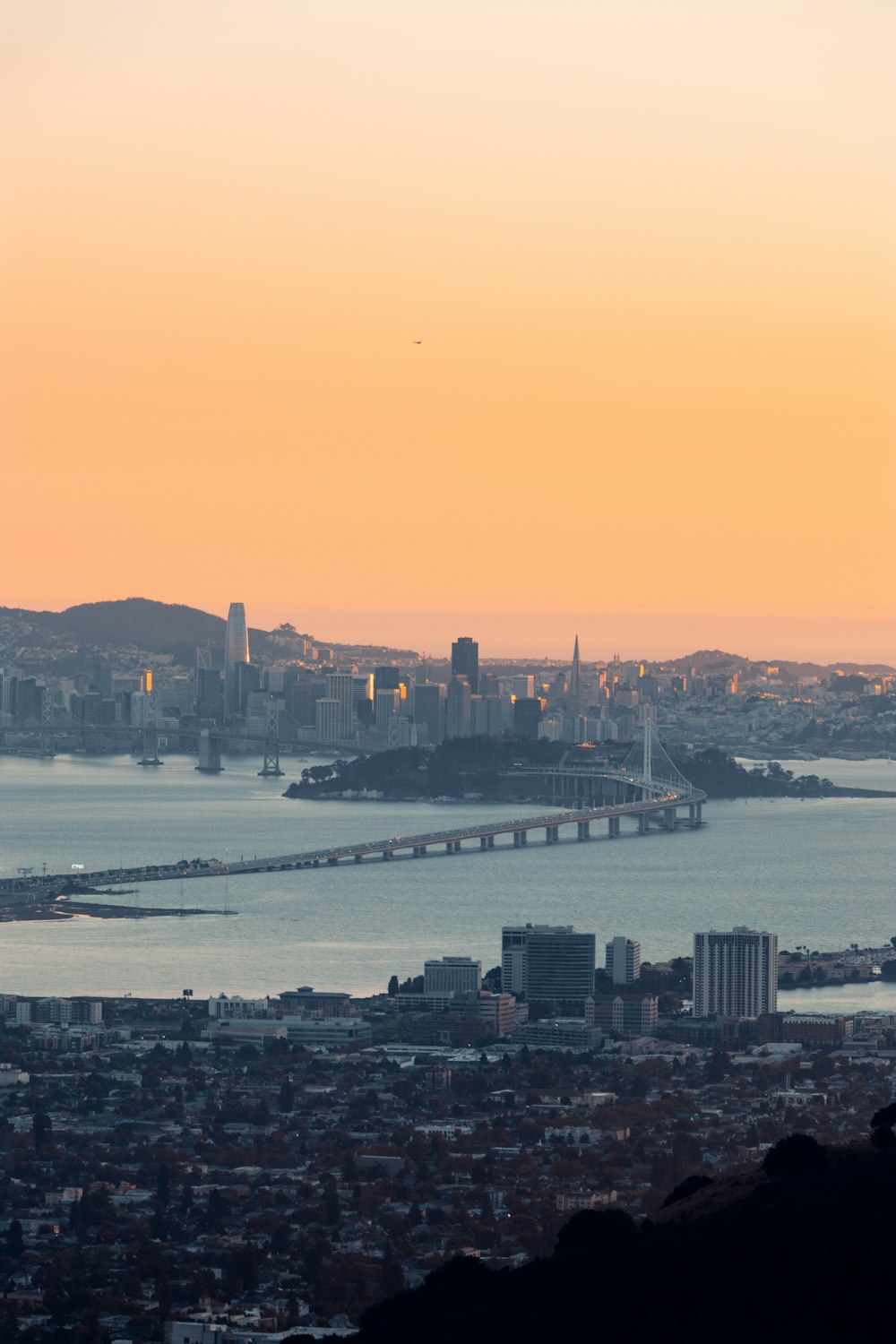 city skyline near body of water during daytime