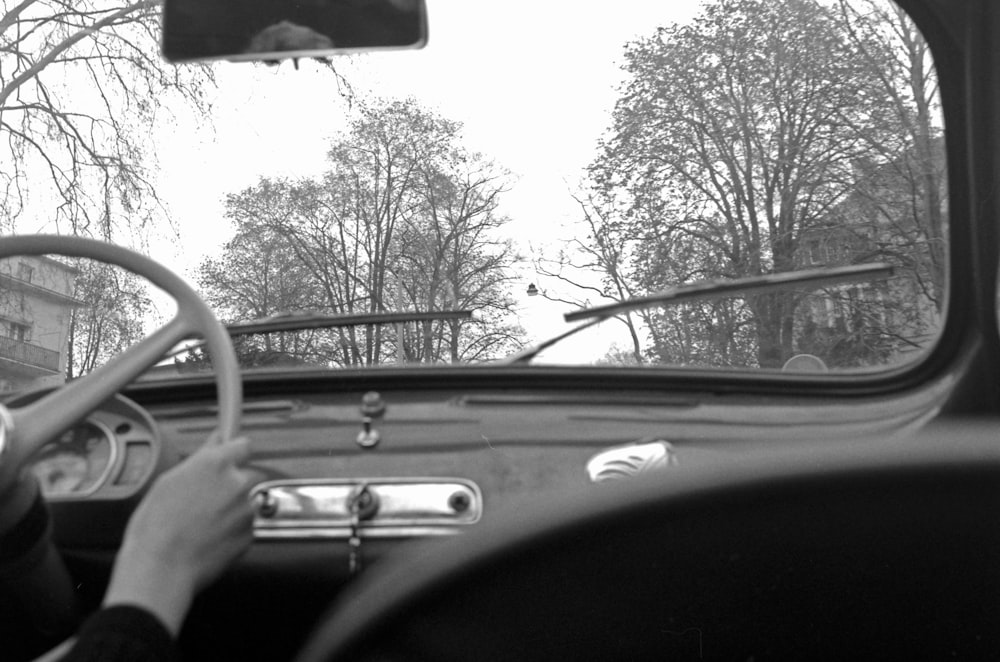 grayscale photo of car interior