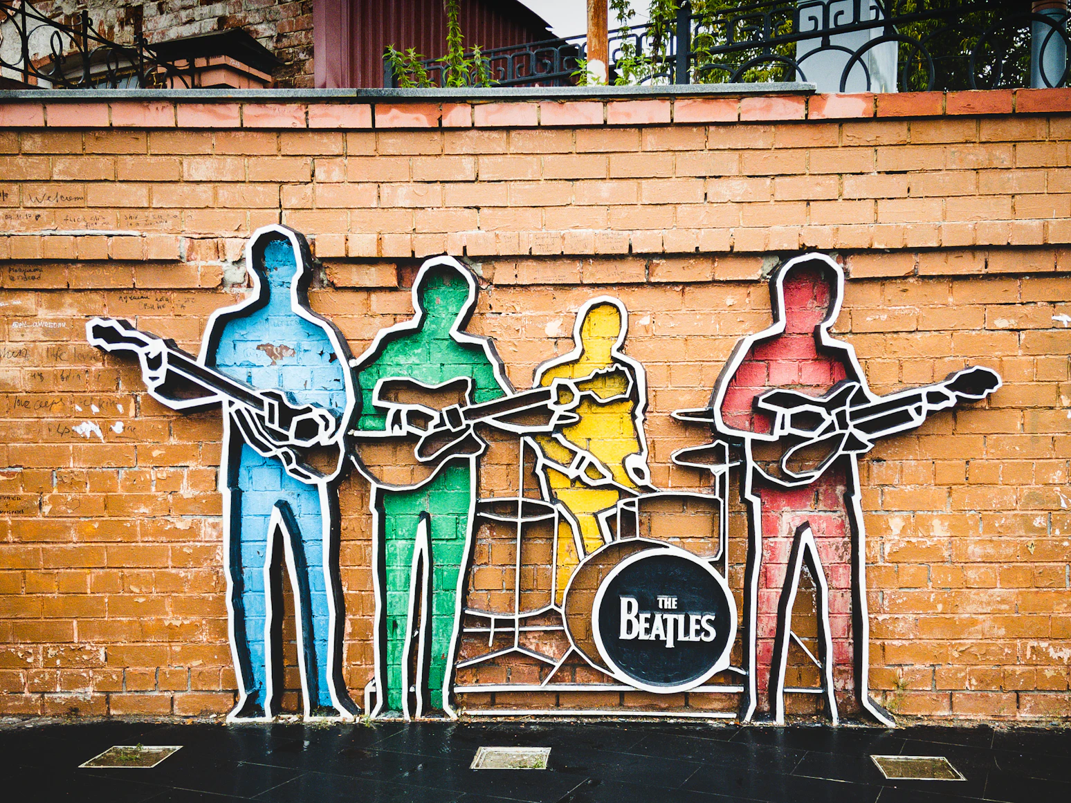 A vintage Beatles record on a turntable, representing the enduring legacy of the band's catalogue across America