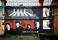 Iconic Abbey Road album cover photo with the band crossing the street.