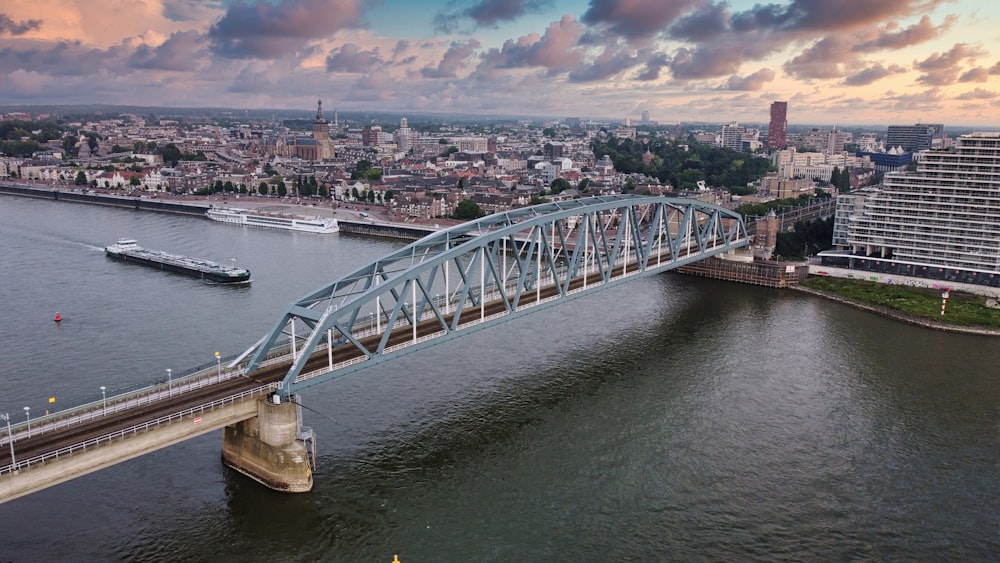 white bridge over river during daytime