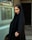 woman in black hijab and black abaya