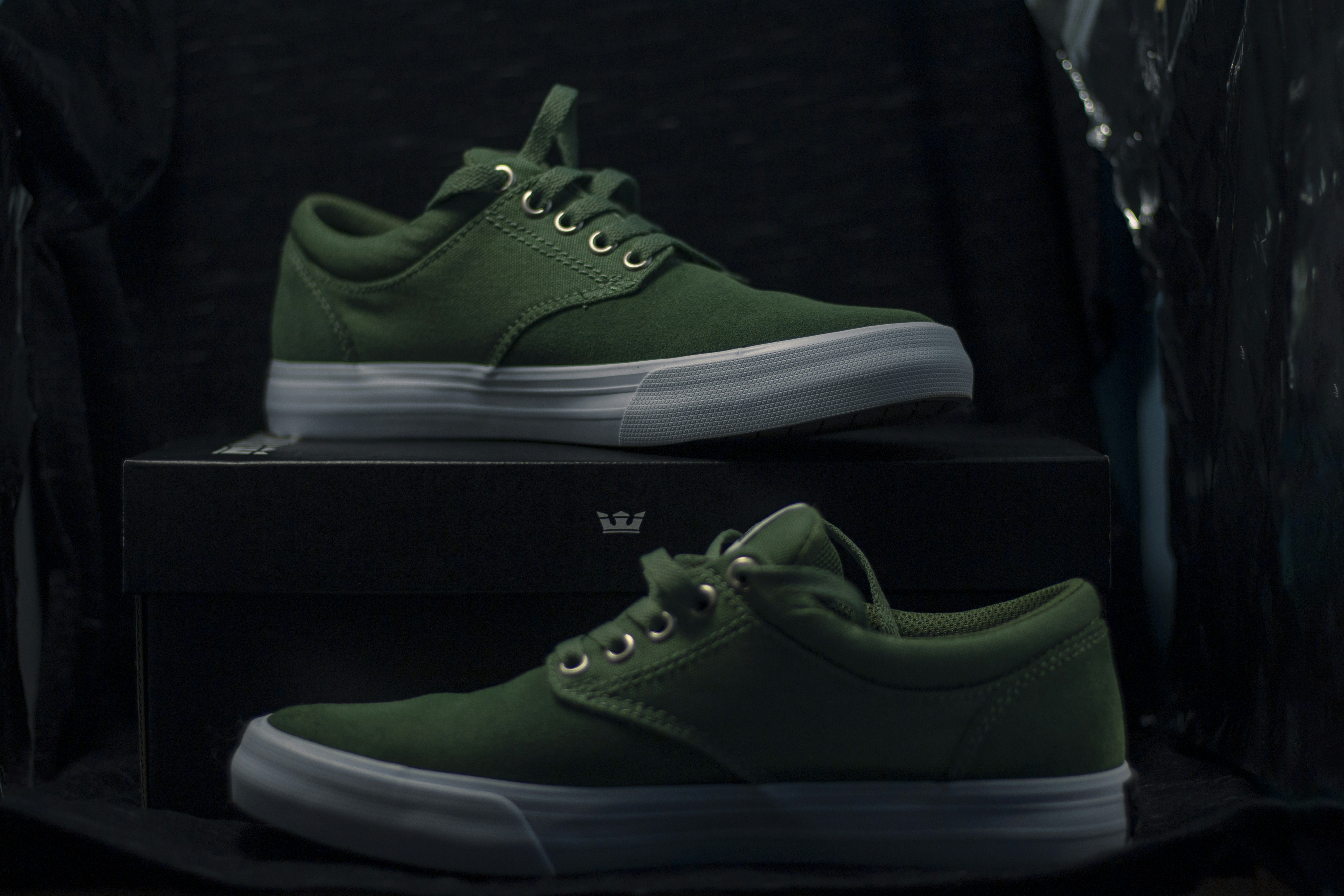 green and white nike low top sneakers