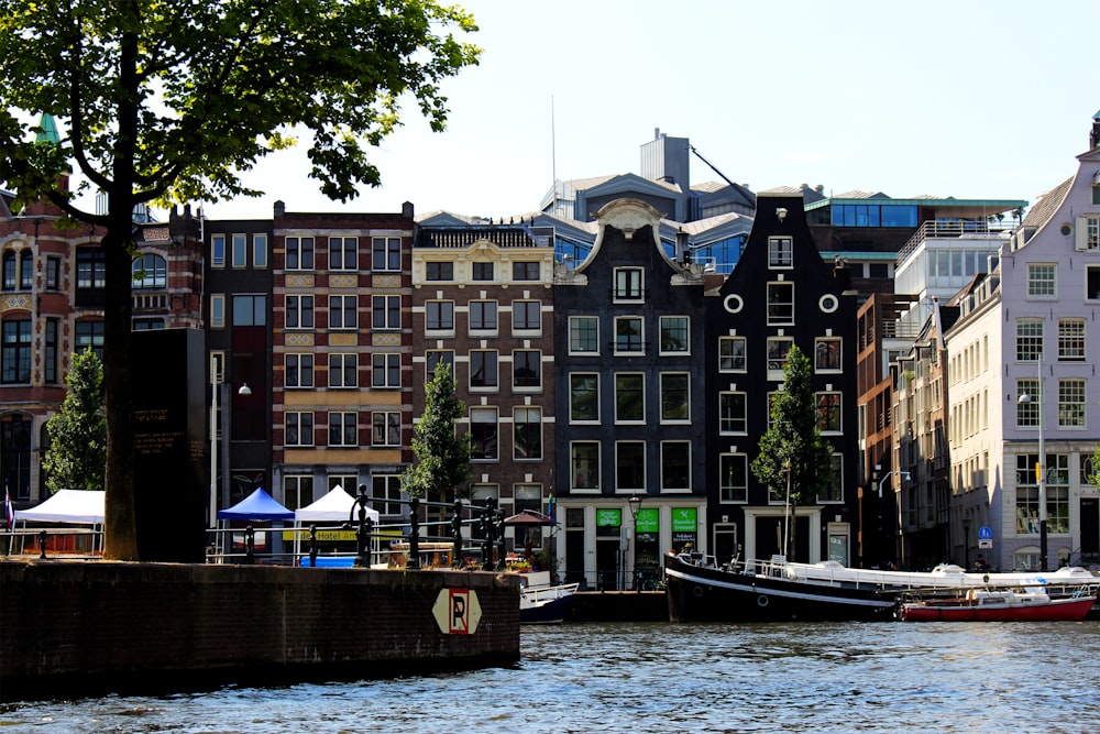 boat on water near building during daytime