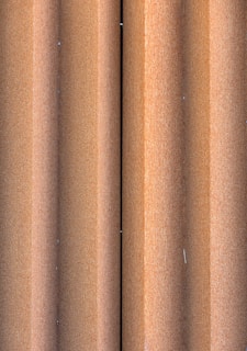 Close-up of textured galvanized rolls showing their protective coating.