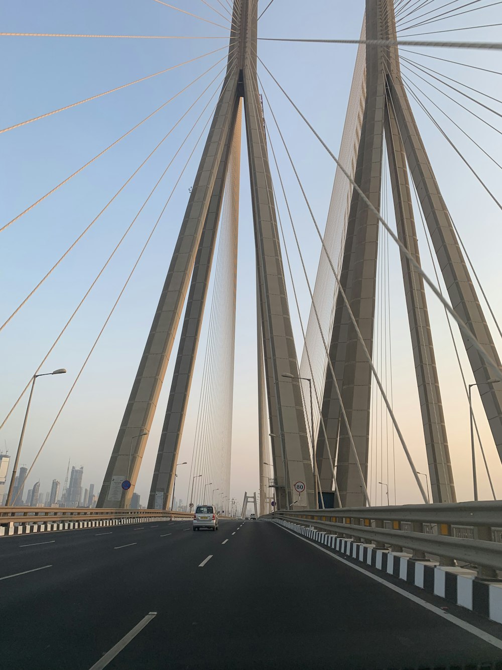 cars on bridge during daytime