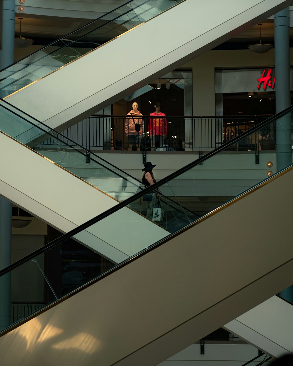 people walking on white and black staircase