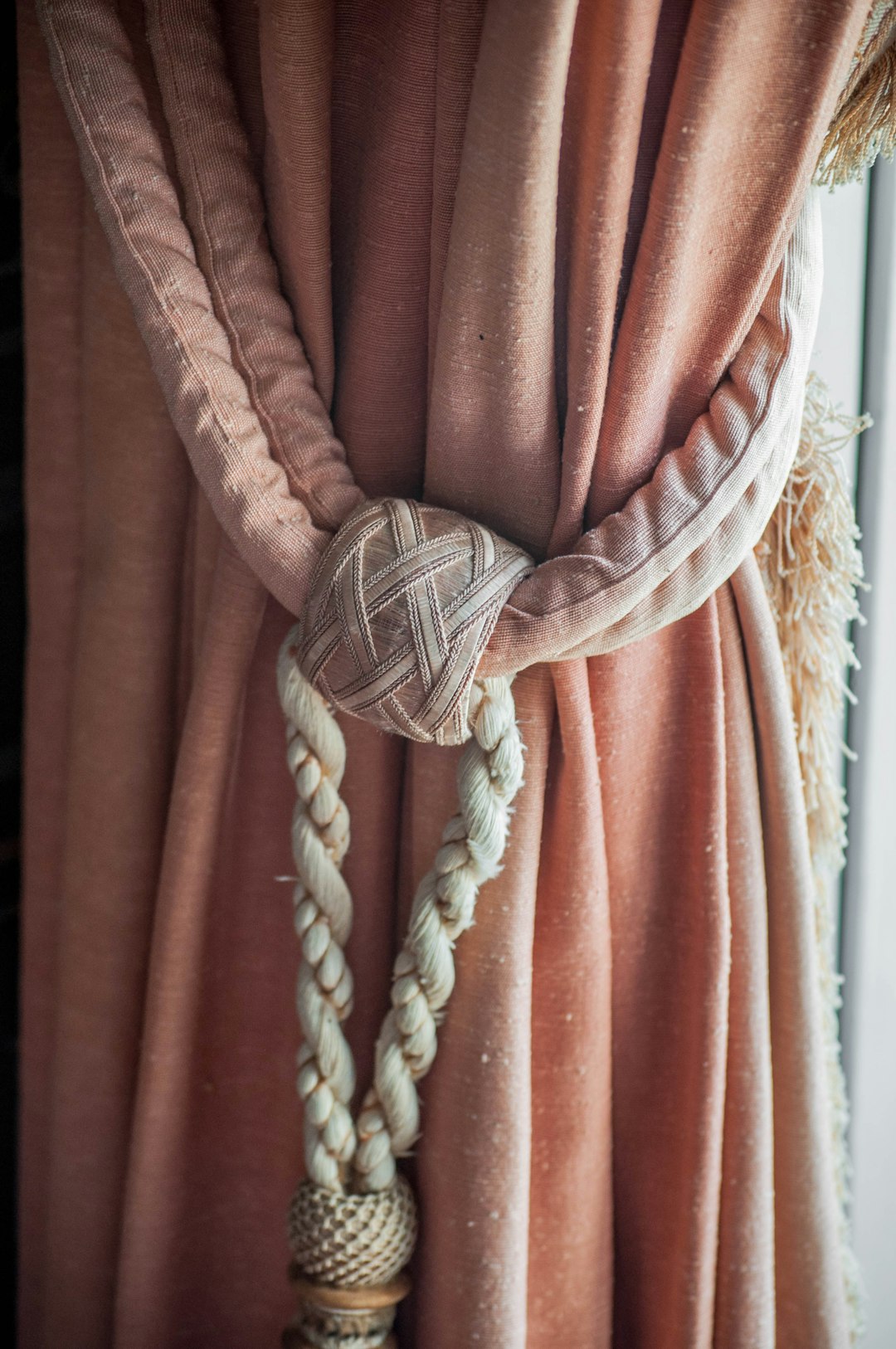 brown and white textile on brown wooden surface