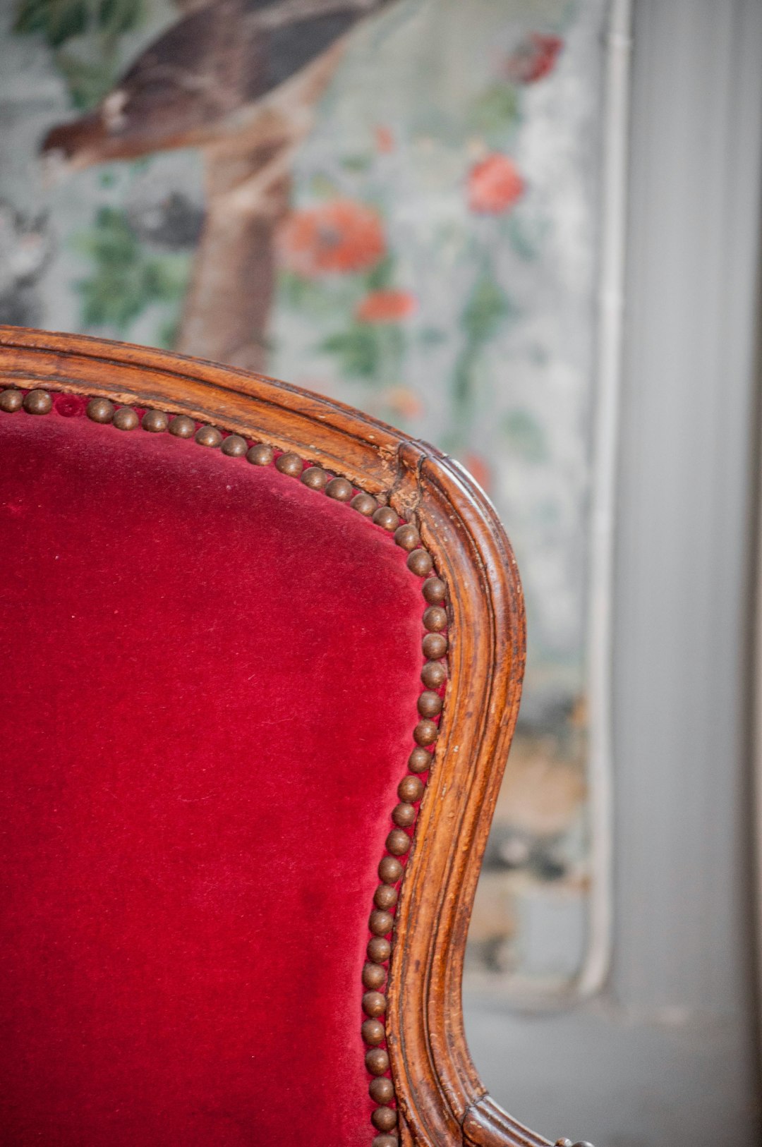 red and brown wooden chair