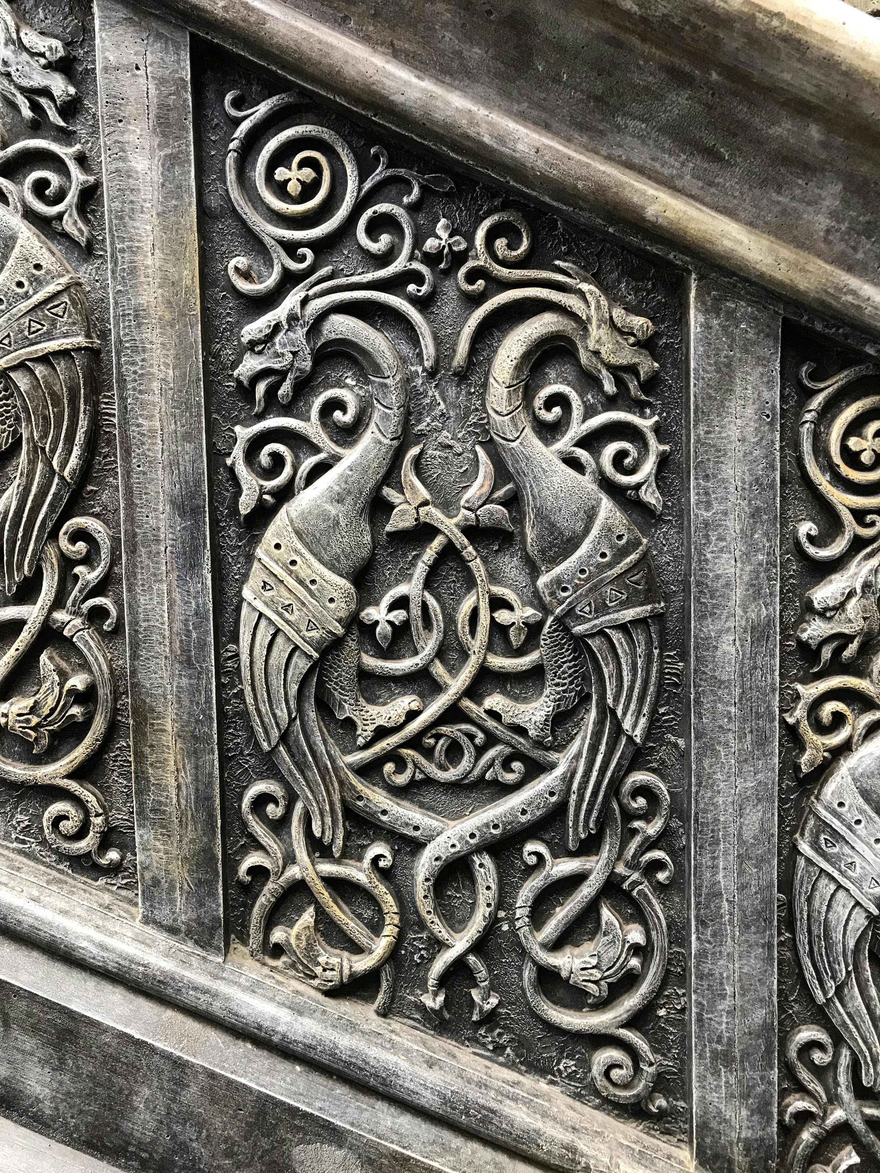 brown wooden door with gold door lever