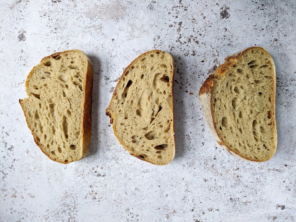 brown bread on white and black surface