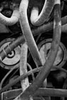 grayscale photo of metal wire