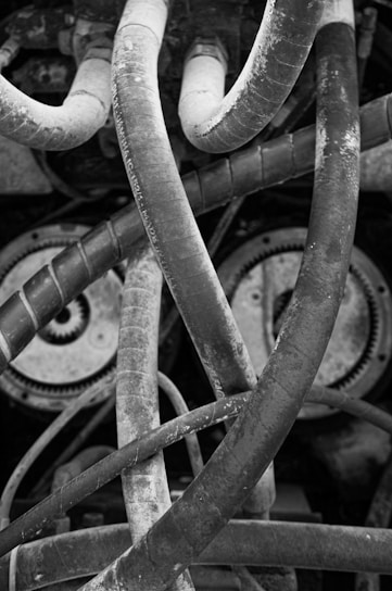 grayscale photo of metal wire
