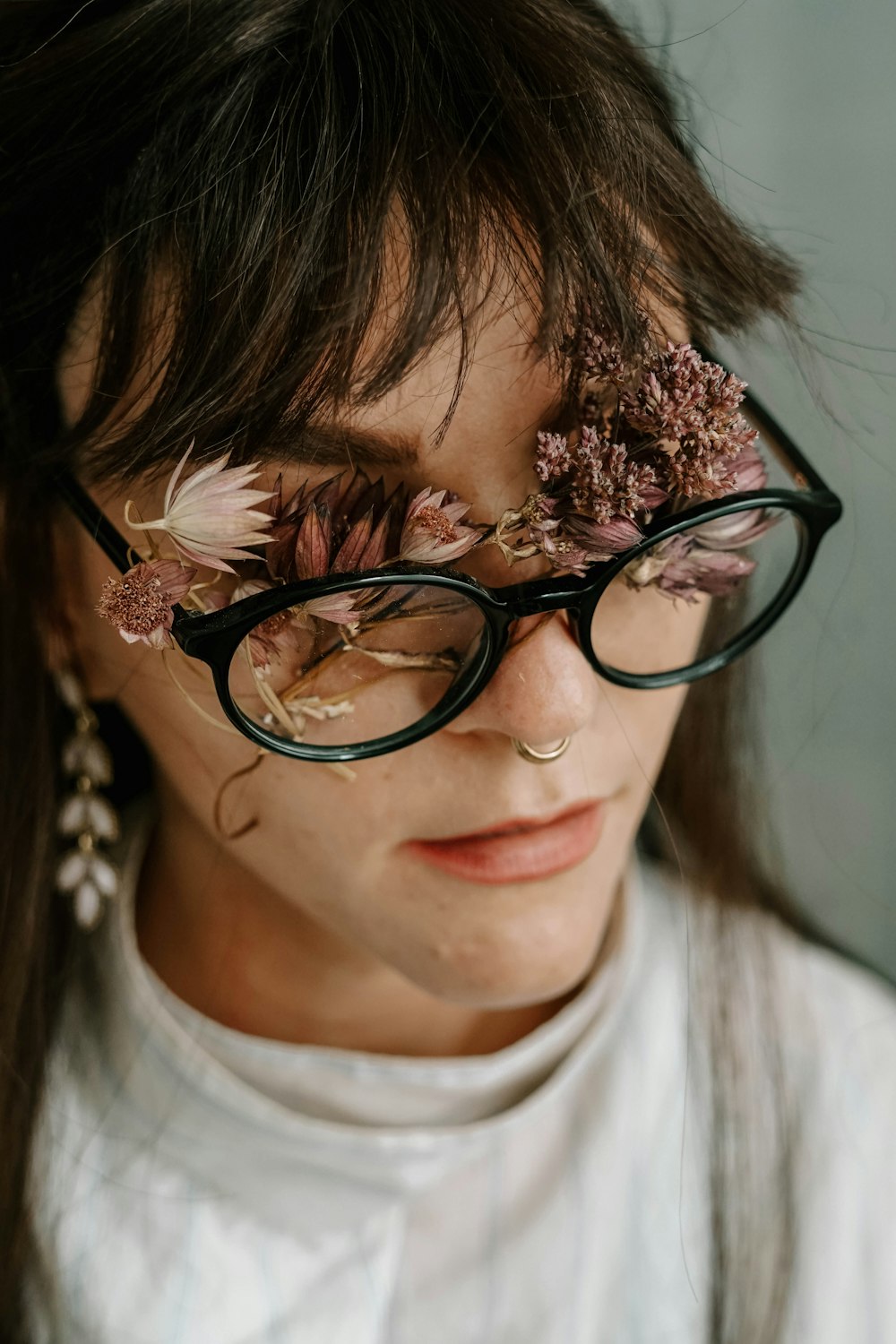 woman in black frame eyeglasses