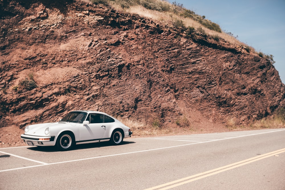 silver coupe on road during daytime