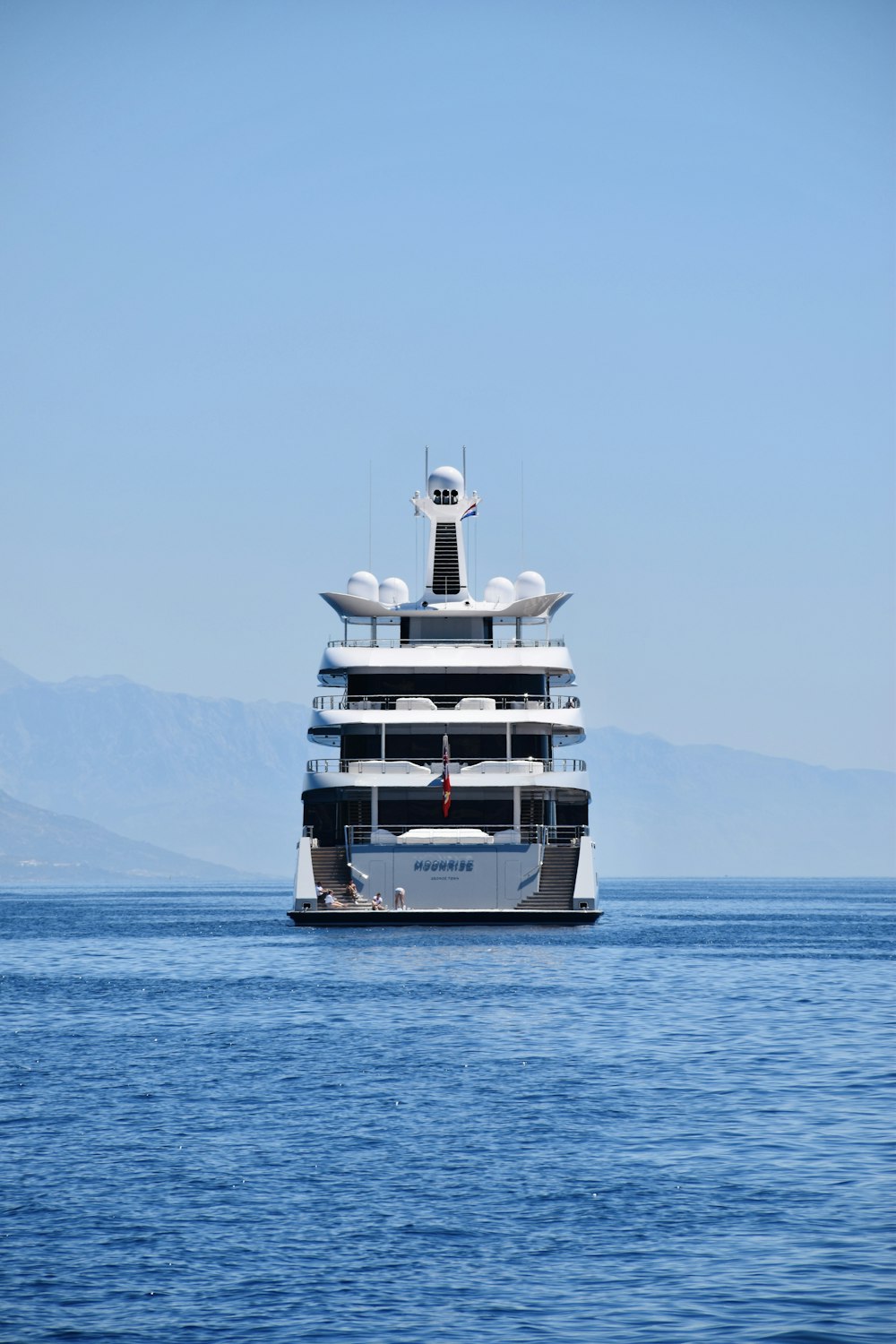 white and black ship on sea during daytime