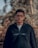man in black sweater wearing black framed eyeglasses