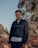 man in black sweater wearing black framed eyeglasses