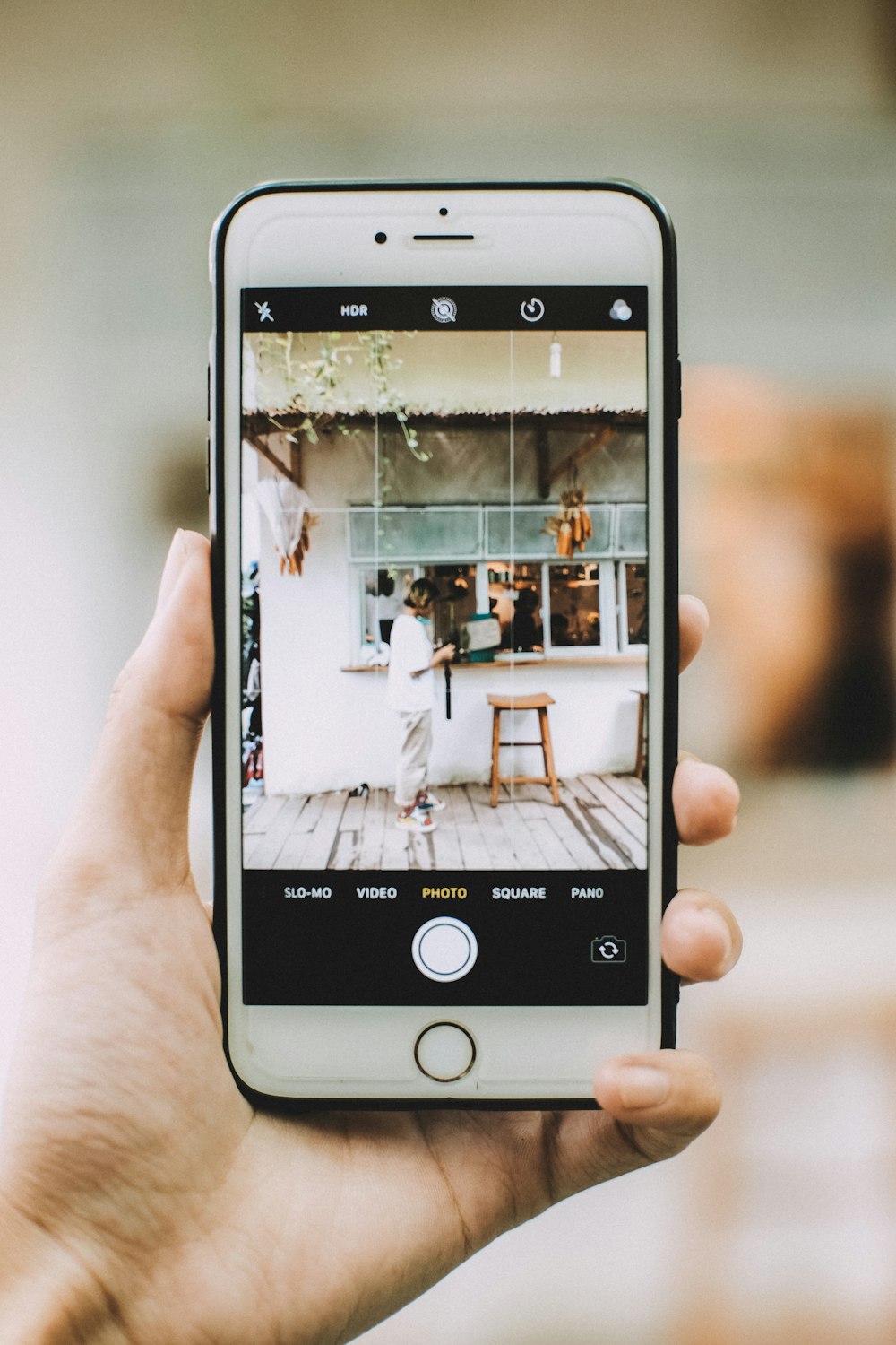 person holding silver iphone 6