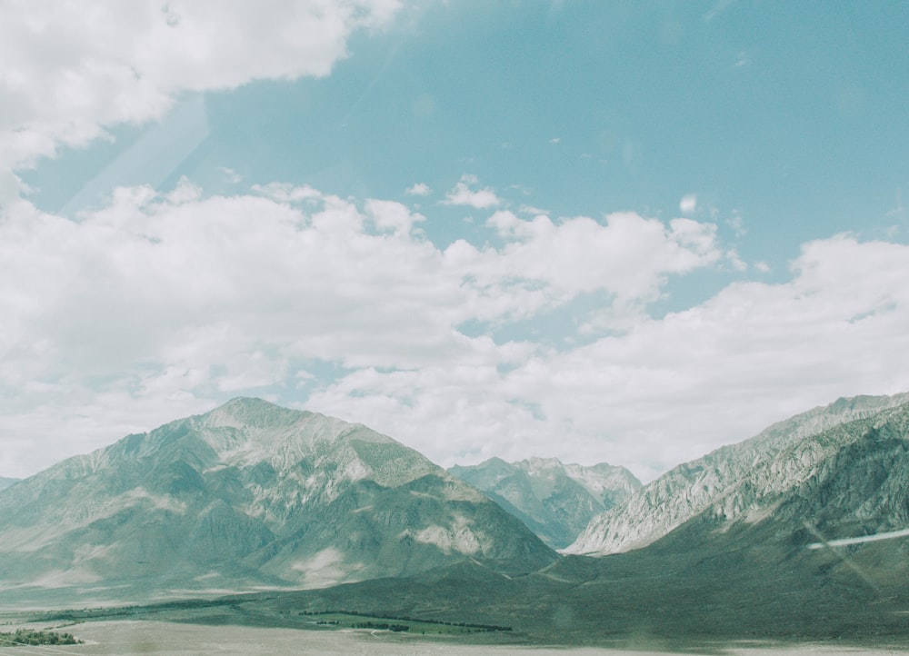 green mountains under blue sky during daytime