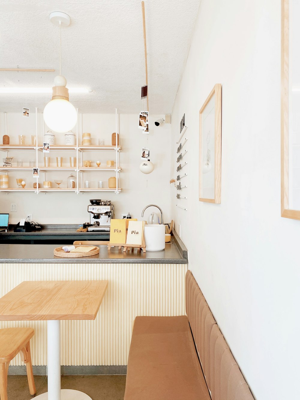 white ceramic mug on brown wooden table