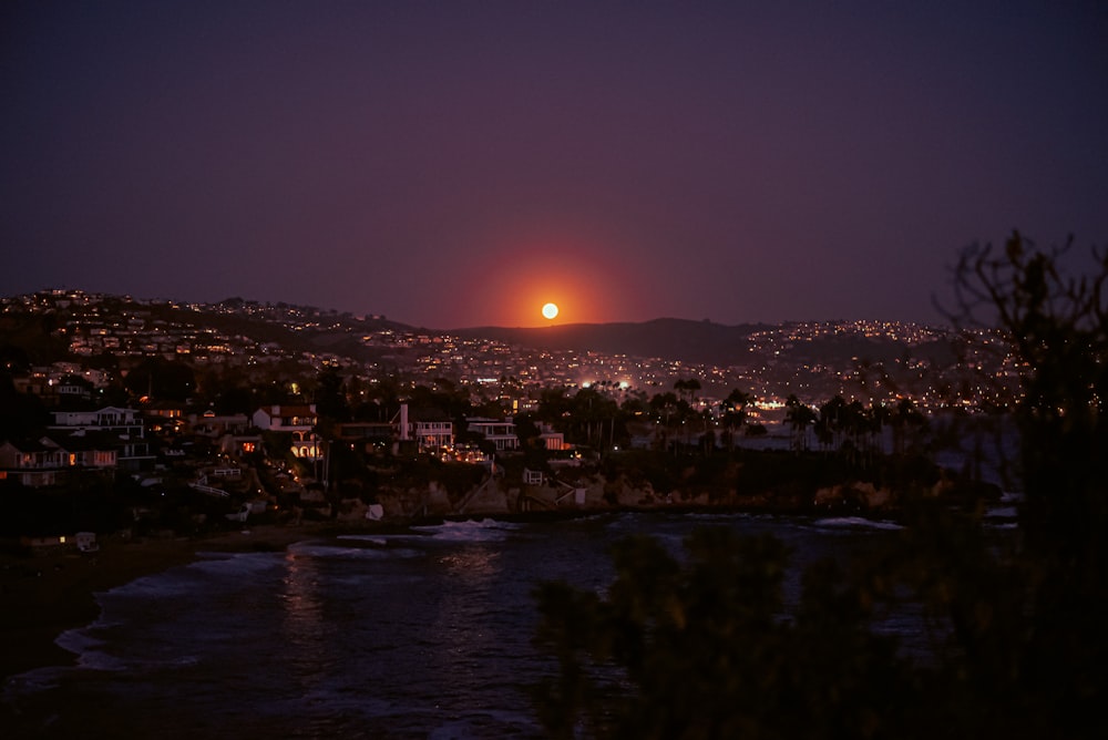 city lights turned on during night time