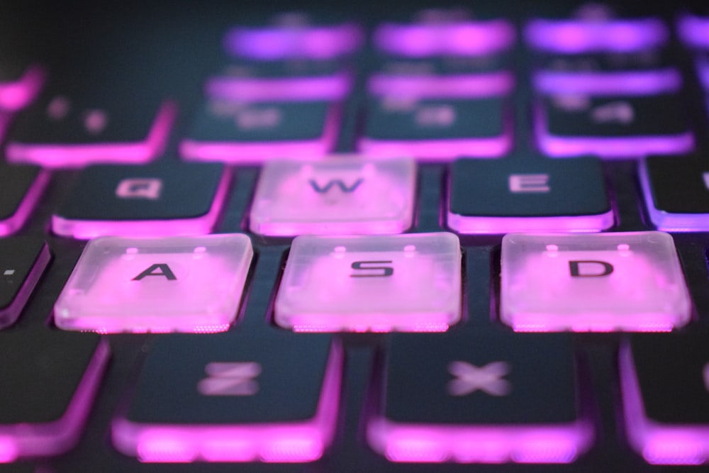 black and purple computer keyboard