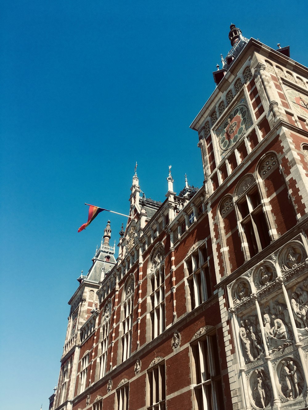 brown concrete building under blue sky during daytime