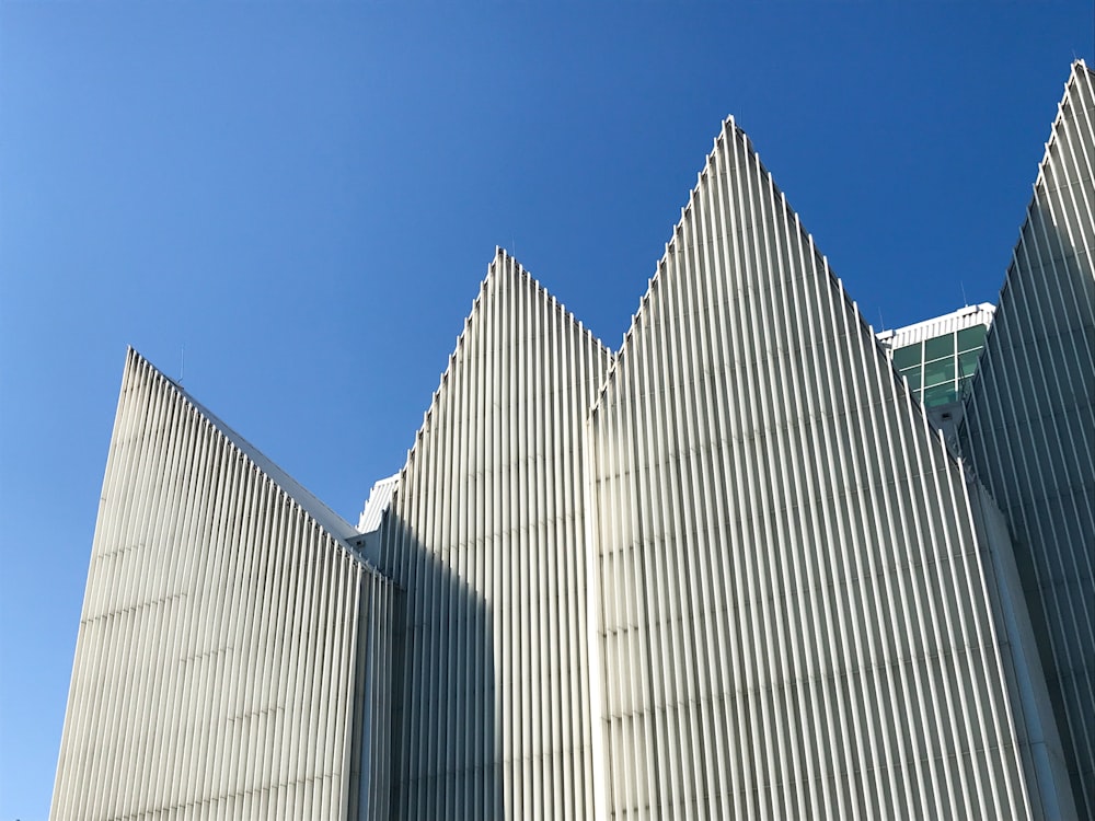 white concrete building under blue sky during daytime