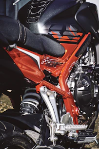Vibrant image of bold, red and black motocross plastics arranged in a clean layout.