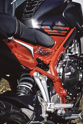 Vibrant image of bold, red and black motocross plastics arranged in a clean layout.