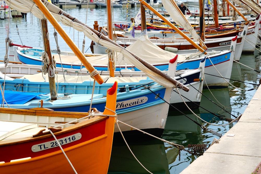 a group of boats docked in a harbor