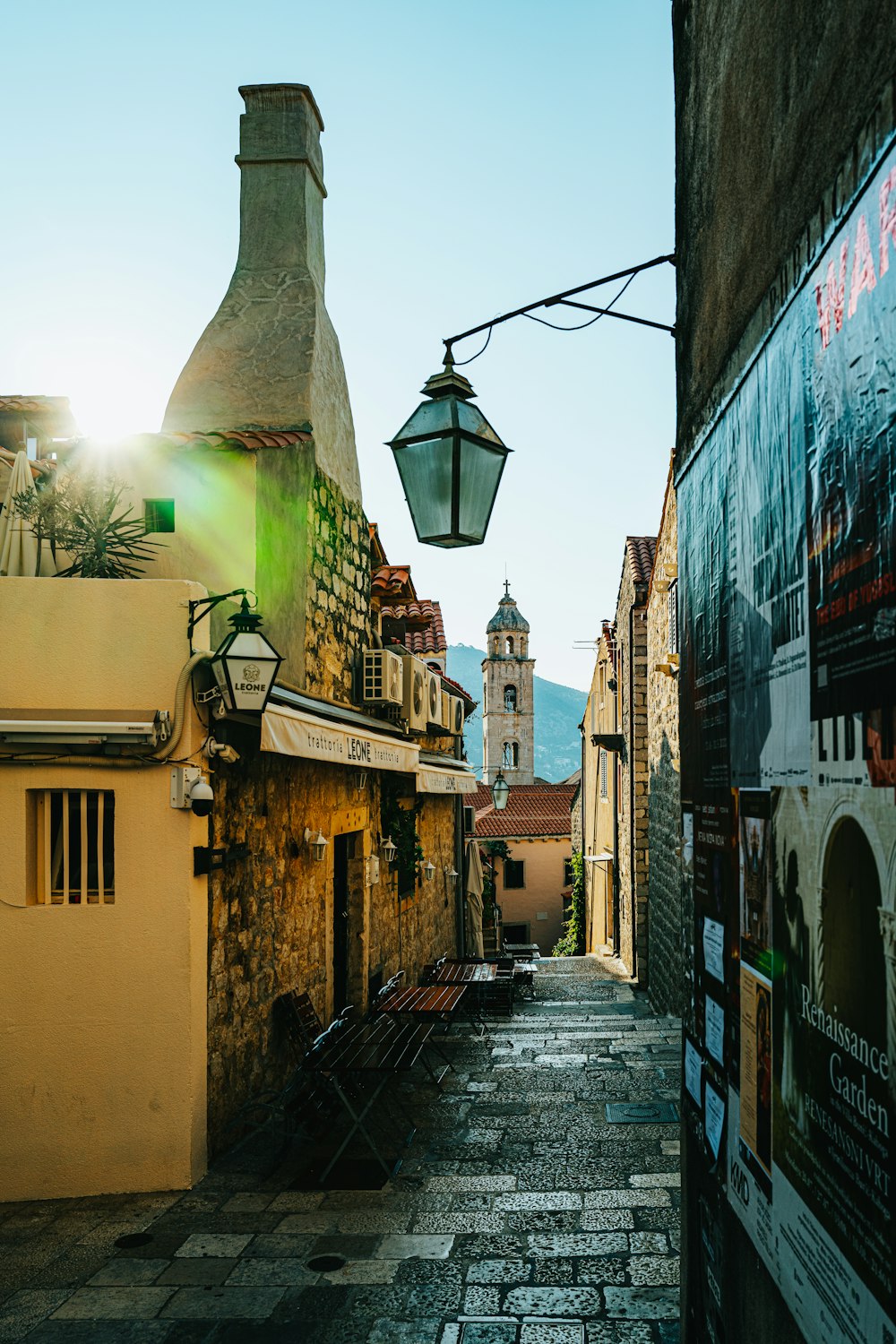 black street light on street during daytime