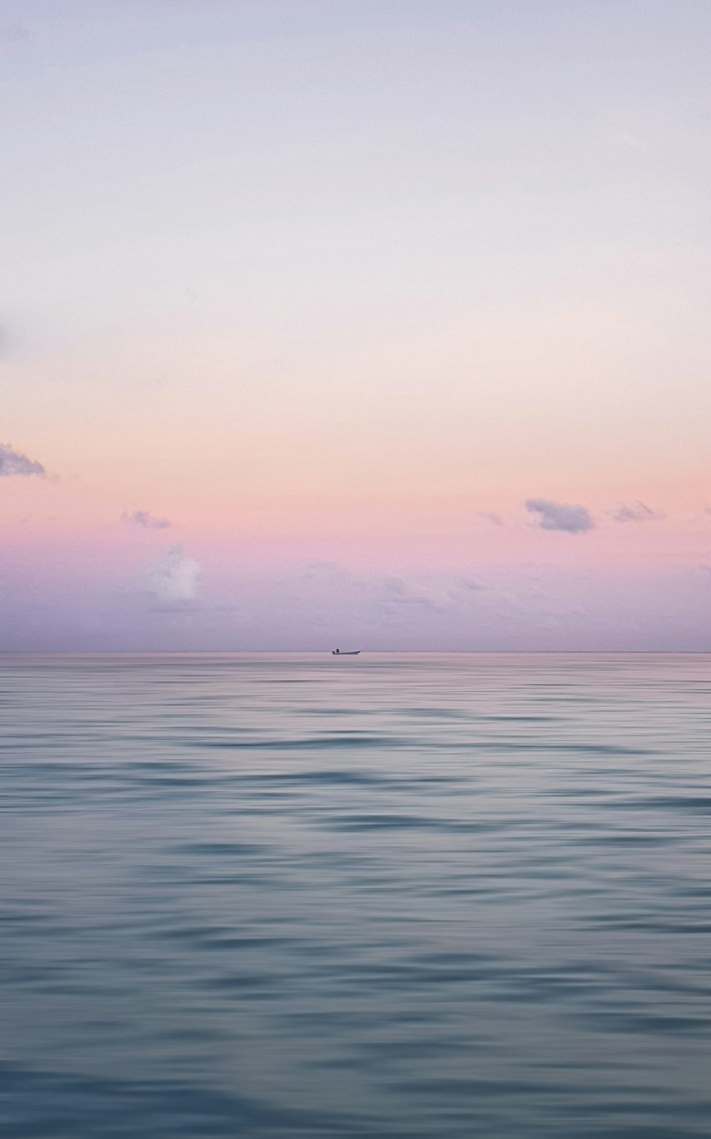 blue sea under blue sky during daytime