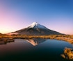 mountain near body of water during daytime