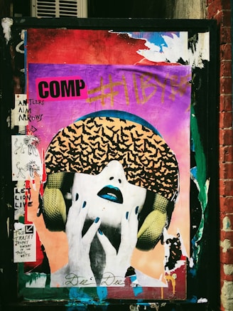 graffiti on a wall above a store