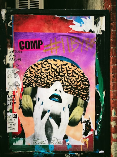 graffiti on a wall above a store