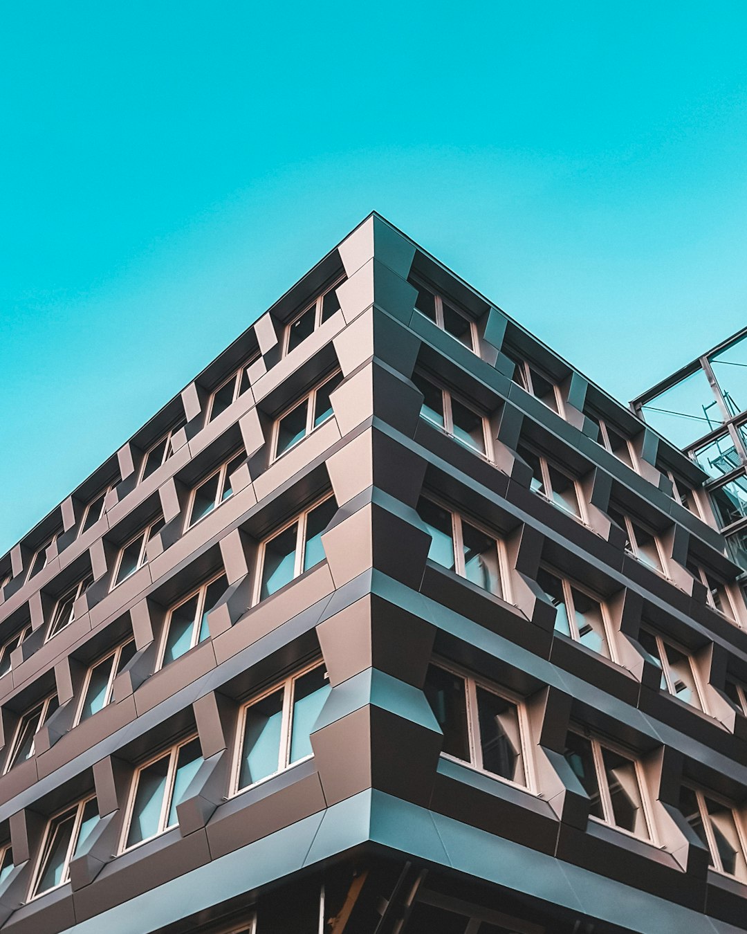 white concrete building under blue sky during daytime