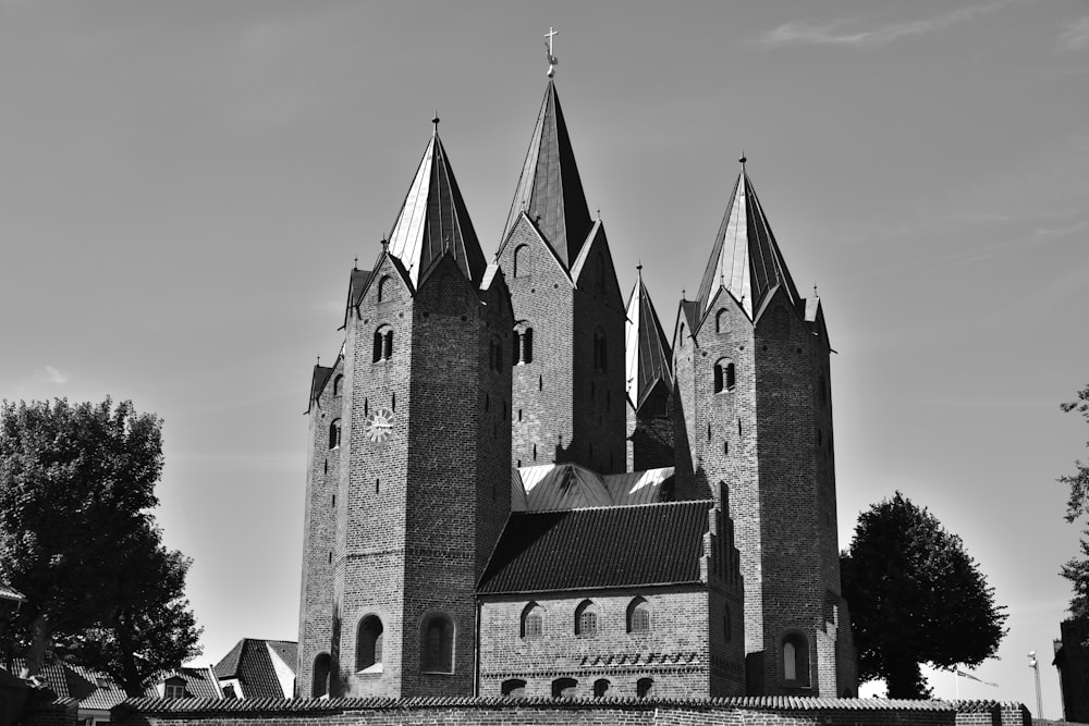 grayscale photo of brick building