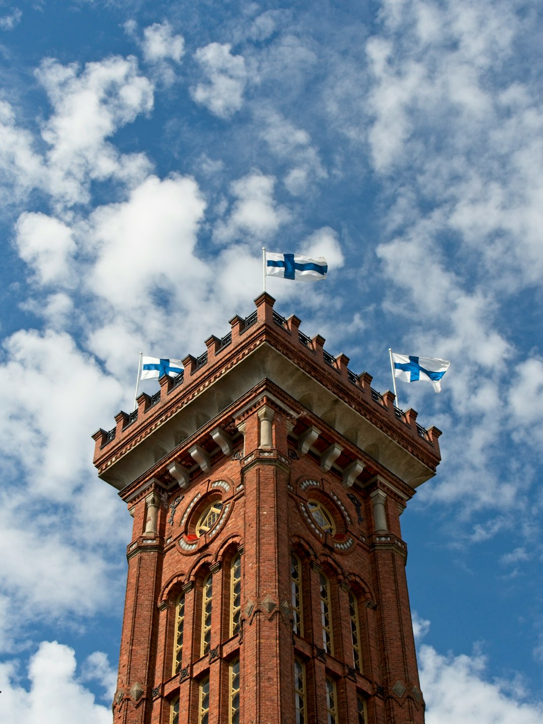 brown concrete building under blue sky during daytime