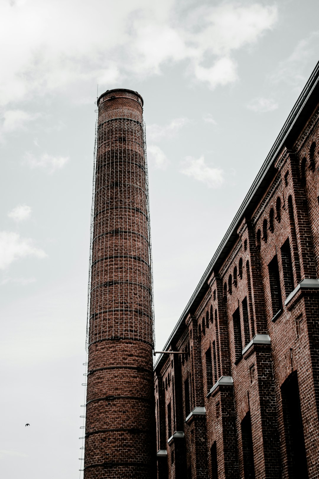 brown concrete building under white sky during daytime