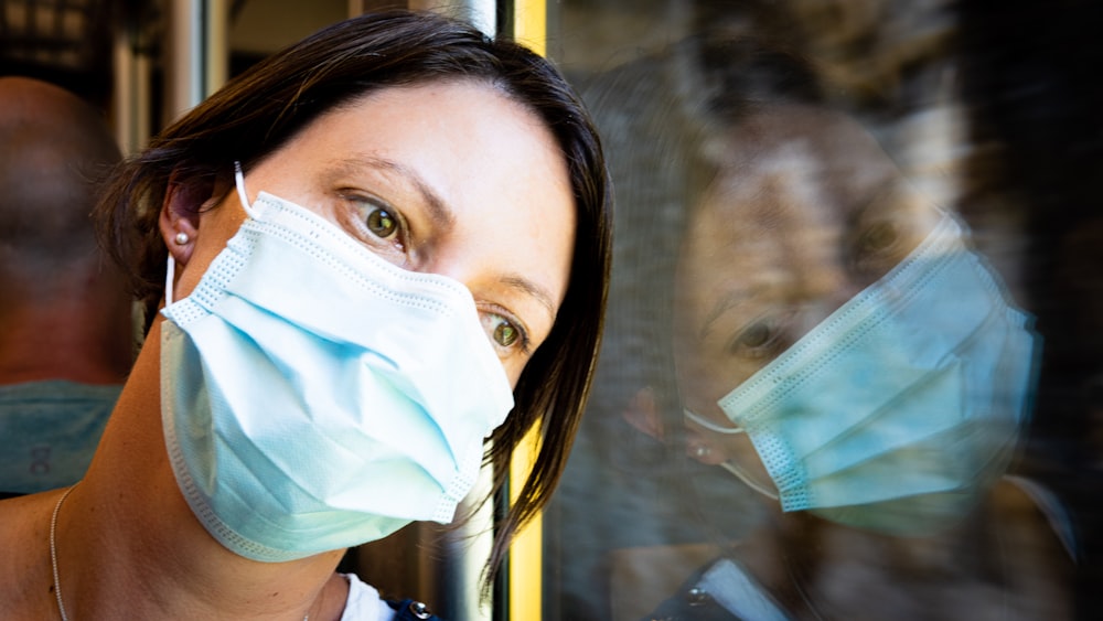 woman in white face mask