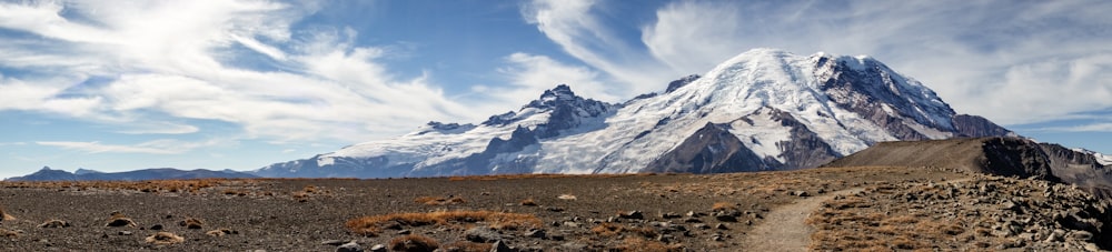 white and black mountains under blue sky during daytime