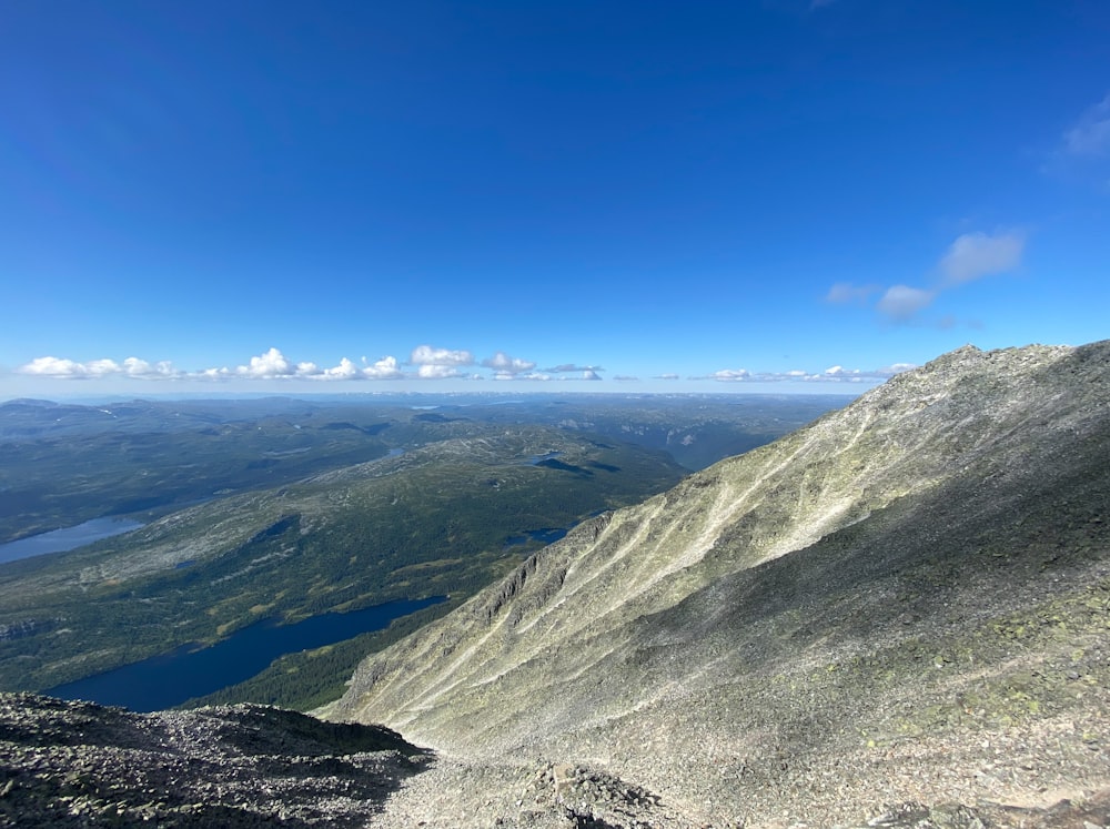 green and gray mountain under blue sky during daytime