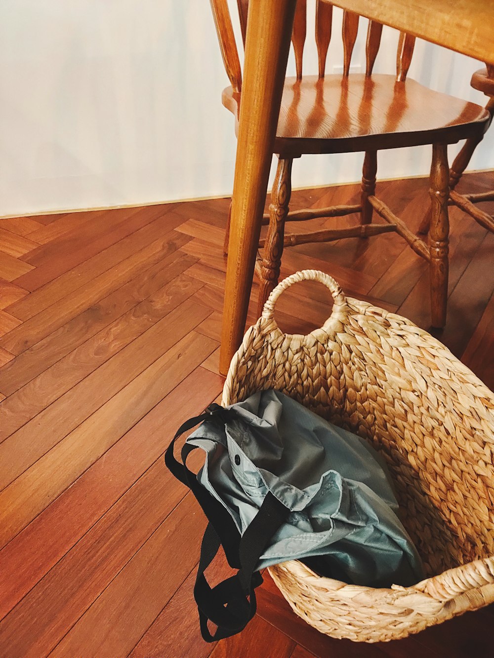 brown woven chair with gray textile