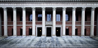 a large building with columns and steps leading up to it