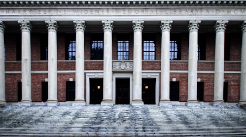 a large building with columns and steps leading up to it